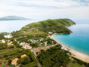 an aerial view of a beach and the ocean at Glamping at Elba in Lacona