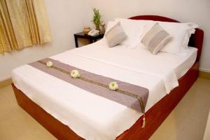 Letto o letti in una camera di Siem Reap Comforts Hostel