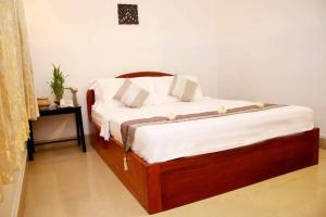Letto o letti in una camera di Siem Reap Comforts Hostel