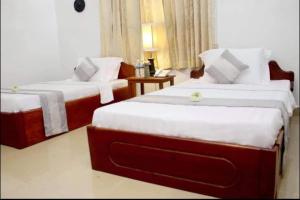 Letto o letti in una camera di Siem Reap Comforts Hostel