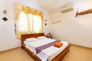 Letto o letti in una camera di Siem Reap Comforts Hostel