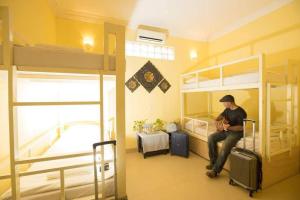 Letto o letti in una camera di Siem Reap Comforts Hostel