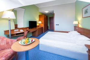 Postel nebo postele na pokoji v ubytování Aquarell Hotel + 31 fotografií