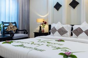 Letto o letti in una camera di Siem Reap Comforts Hostel