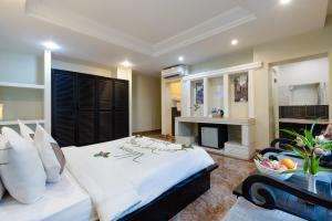 Letto o letti in una camera di Siem Reap Comforts Hostel