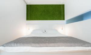 Unique Rooms客房内的一张或多张床位