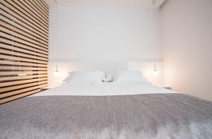 Unique Rooms客房内的一张或多张床位