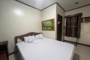 Postel nebo postele na pokoji v ubytování Tenzai Homestay
