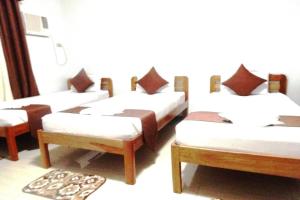 Postel nebo postele na pokoji v ubytování Tenzai Homestay