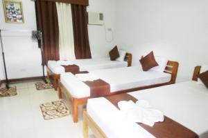 Postel nebo postele na pokoji v ubytování Tenzai Homestay