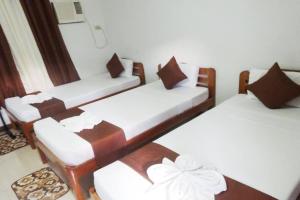 Postel nebo postele na pokoji v ubytování Tenzai Homestay