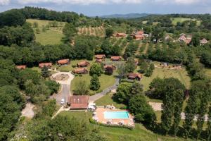 an aerial view of a estate with a swimming pool at Les Chalets de Thegra proche de Rocamadour et Padirac in Thégra