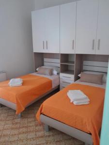 Llit o llits en una habitació de Villa Rospi