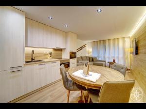 A kitchen or kitchenette at MONTLUDE de Alma de Nieve