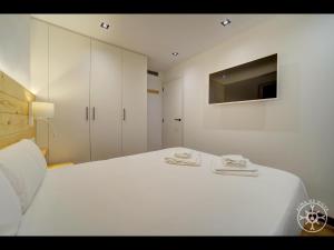 A bed or beds in a room at MONTLUDE de Alma de Nieve