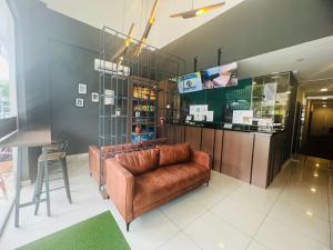 Kuchyň nebo kuchyňský kout v ubytování Smile Hotel Subang Airport