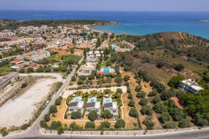 an aerial view of a city and the ocean at Ethereal Villas Chania in Daratso
