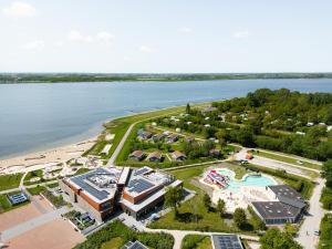 an aerial view of a resort next to the water at Glamping Schotsman in Kamperland
