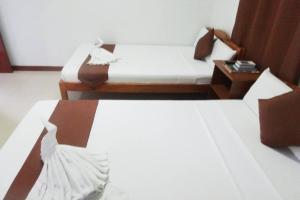 Postel nebo postele na pokoji v ubytování Tenzai Homestay