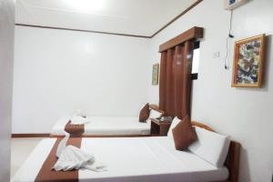 Postel nebo postele na pokoji v ubytování Tenzai Homestay