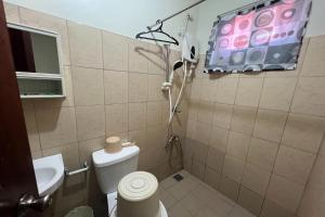 Koupelna v ubytování Tenzai Homestay