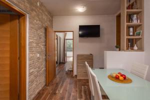 Μια τηλεόραση ή/και κέντρο ψυχαγωγίας στο Apartments Hablando