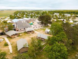 an aerial view of a small village with houses at Glamping Callantsoog in Callantsoog