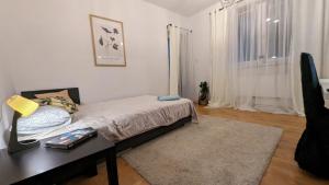 Postel nebo postele na pokoji v ubytování Hostel Vincent