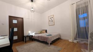 Postel nebo postele na pokoji v ubytování Hostel Vincent