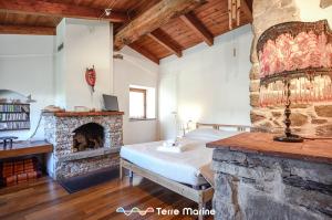 Postel nebo postele na pokoji v ubytování L'Occhio di Santa Lucia, Terre Marine