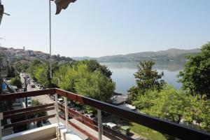 a view of a river from a balcony at Nana's & Pepi's House in Kastoria