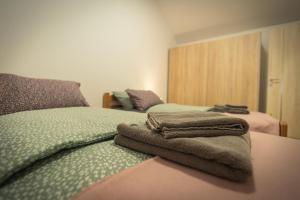 Кровать или кровати в номере Cuckoo's Alpine Nest
