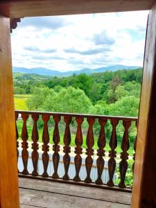 a balcony with a view of the mountains at "Бджілка" in Lyuta