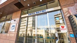 a store front of a building with glass windows at Toyoko Inn Osaka Umeda Nakatsu No.2 in Osaka +32 photos