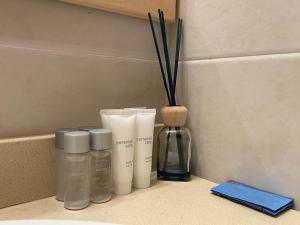 a group of products sitting on top of a counter at Apartamento renovado cerca de la playa in Lloret de Mar