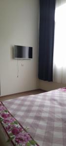 Letto o letti in una camera di guest hause giorgi,kobuleti- xala