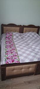 Letto o letti in una camera di guest hause giorgi,kobuleti- xala