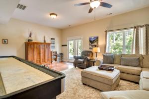 a living room with a pool table at Blue Ridge Mountain Home with Sunroom Pets Welcome in Fairview