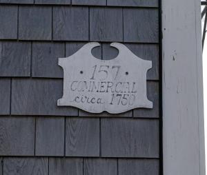 a sign on the side of a building at Martin House 157 in Provincetown