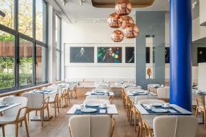 Reštaurácia alebo iné gastronomické zariadenie v ubytovaní Hotel Medium Sitges Park