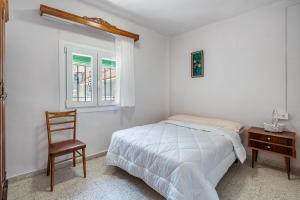 Posteľ alebo postele v izbe v ubytovaní Casa Juan y Loli