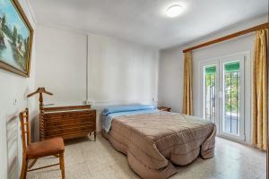 Posteľ alebo postele v izbe v ubytovaní Casa Juan y Loli