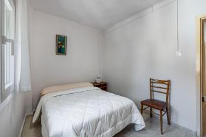 Posteľ alebo postele v izbe v ubytovaní Casa Juan y Loli
