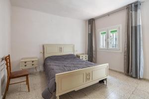 Posteľ alebo postele v izbe v ubytovaní Casa Juan y Loli