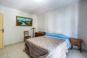 Posteľ alebo postele v izbe v ubytovaní Casa Juan y Loli