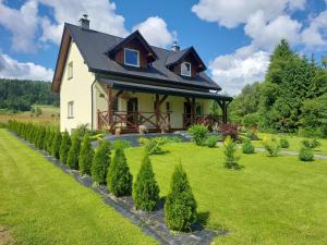 Vonkajšia záhrada v ubytovaní Domek Limba + 10 fotografií
