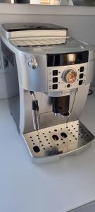 a espresso machine sitting on top of a counter at Logement dans le cœur historique de Mons in Mons