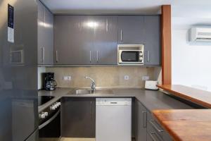 Kuchyň nebo kuchyňský kout v ubytování Chalet adosado en Pasito BM9