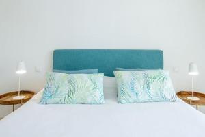 Postel nebo postele na pokoji v ubytování Chalet adosado en Pasito BM9 + 14 fotografií