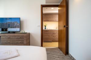 Voodi või voodid majutusasutuse Queen of Sheba Eilat toas